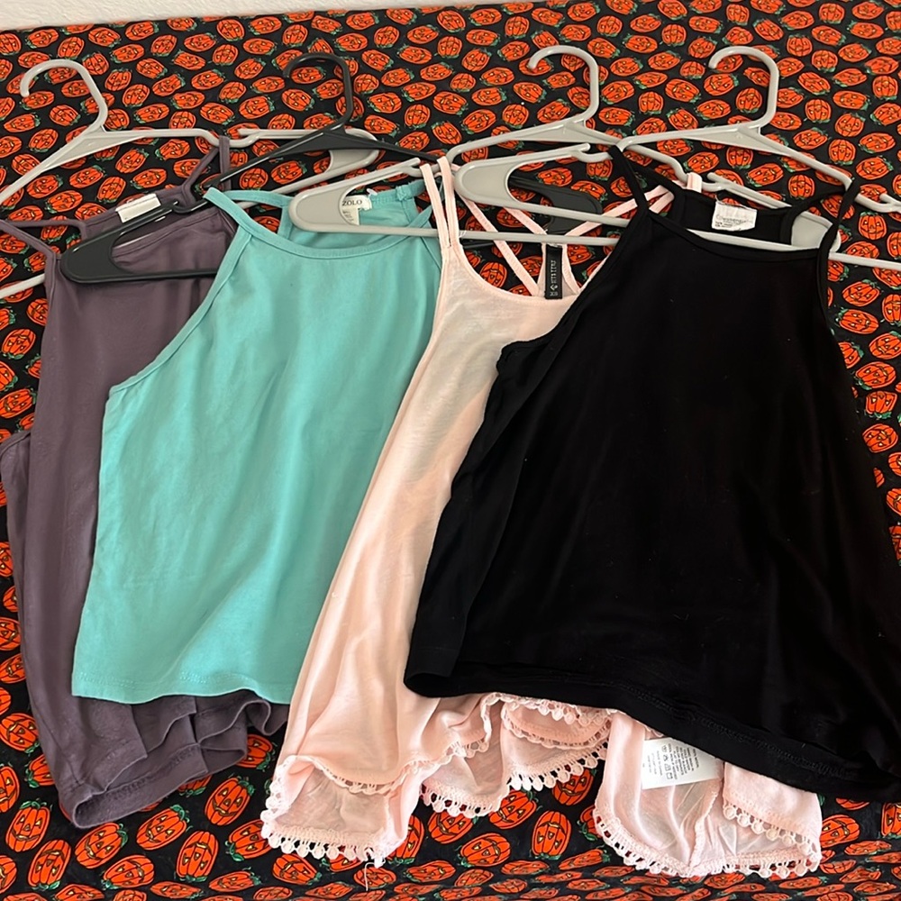 Used bundle of 4 junior spaghetti strap tank tops in solid colors,various sizes
